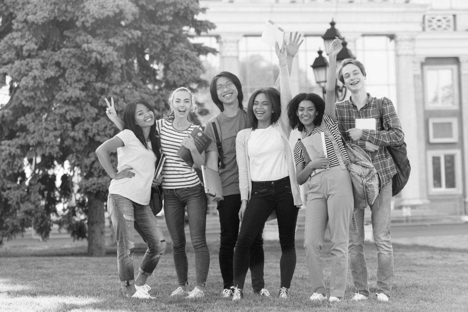 Close-up of hands working with investment planning documents and calculator
